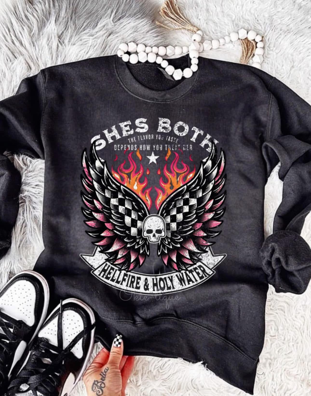 She's Both Hellfire & Holy Water